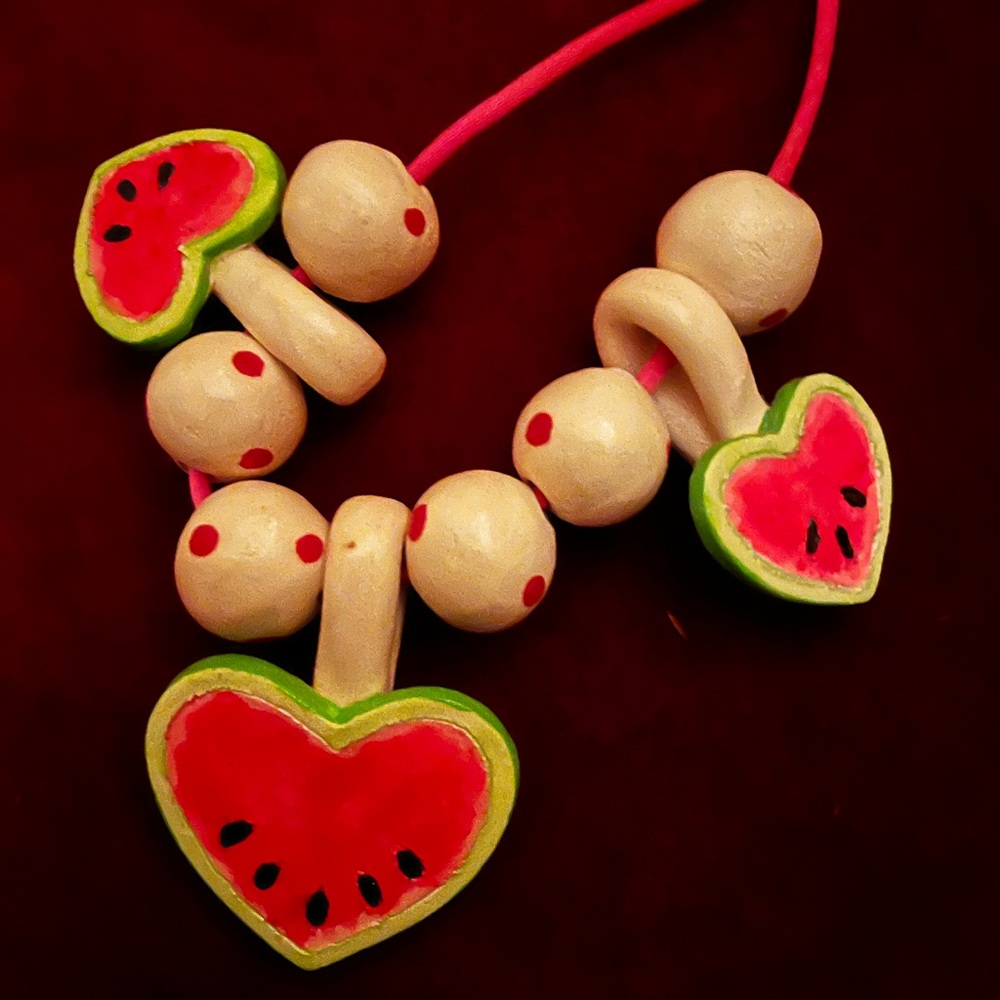 Ceramic necklaces (2) for $13.Great price!